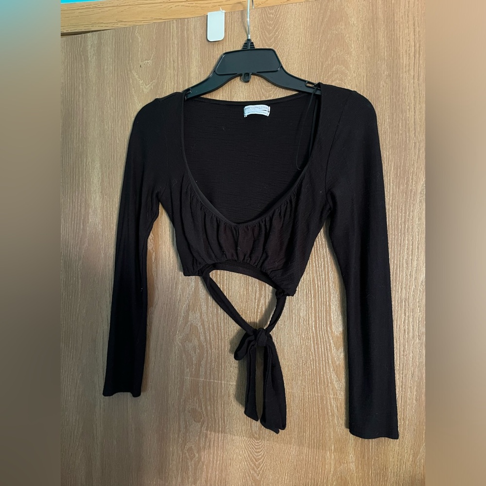 Urban Outfitters black long sleeved crop top with wrap tie front. Size small